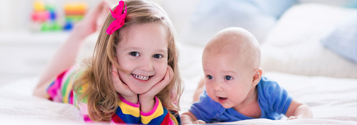 Chiropractic-Grand-Rapids-MI-Children-On-A-Bed.jpg chiropractic care for sciatica and back pain